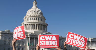 Photo of CWA strong signs being held up by protestors in front of the US capitol. CWA has reached a labor neutrality agreement with Microsoft