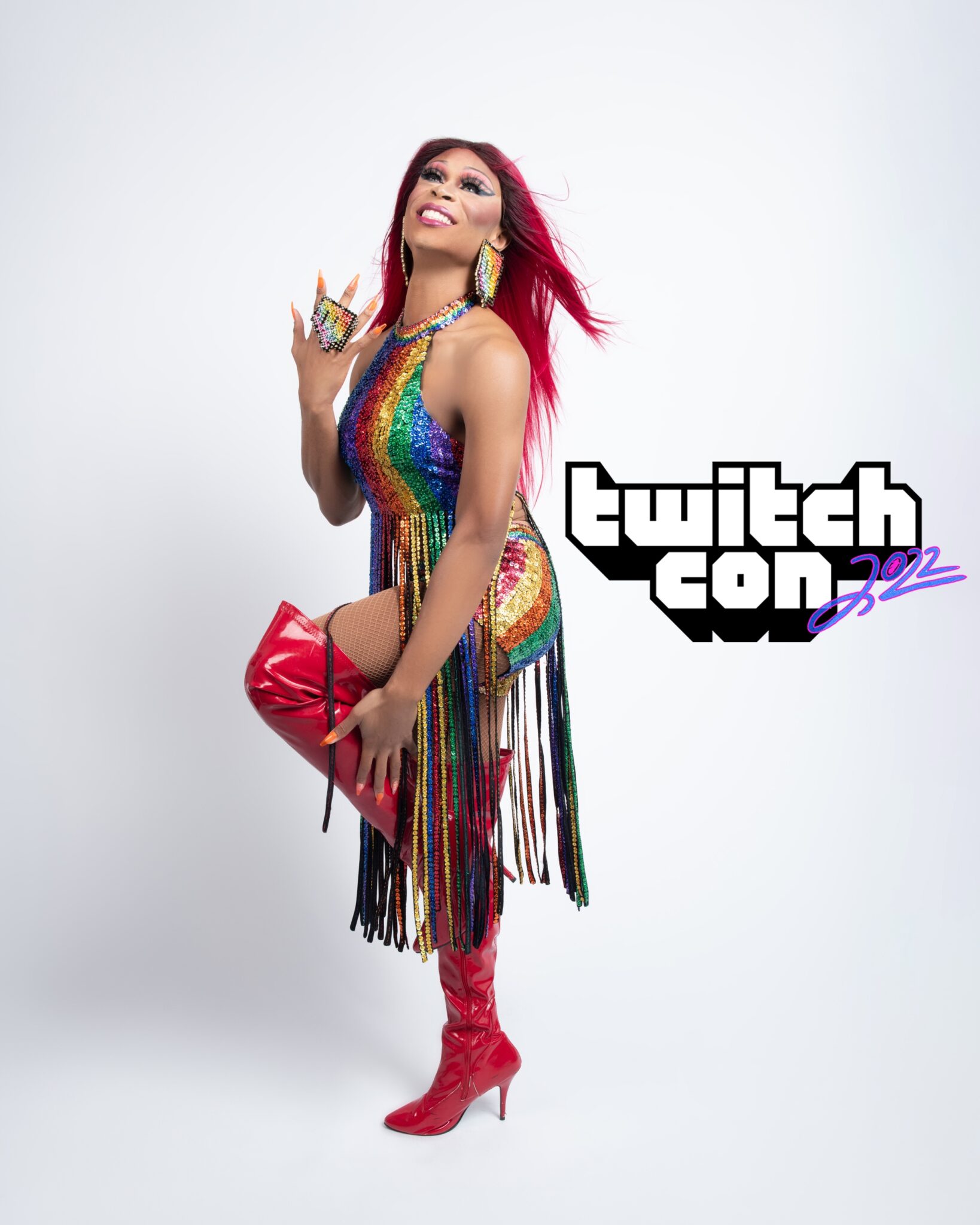 Rose Evergreen in a rainbow sequin outfit posing for Twitch Con 2022
