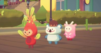 Three ooblets walking in a line down a road