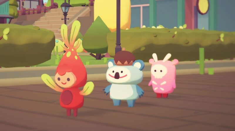 Three ooblets walking in a line down a road