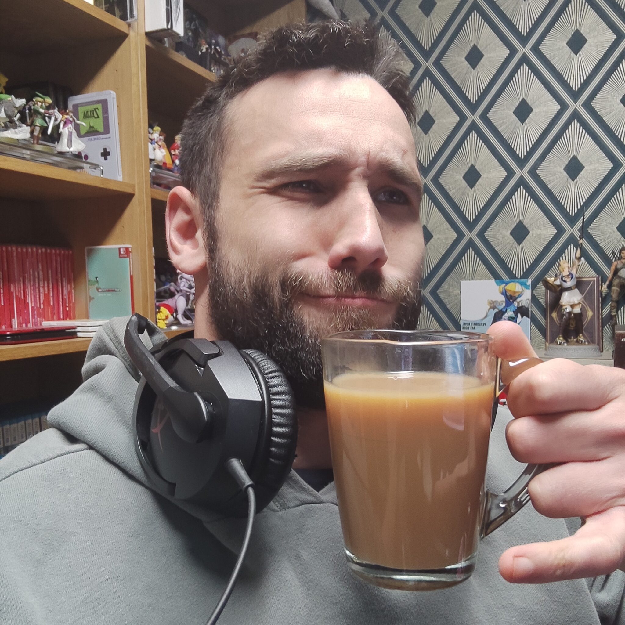 Selfie of PixelManta holding a cup of coffee