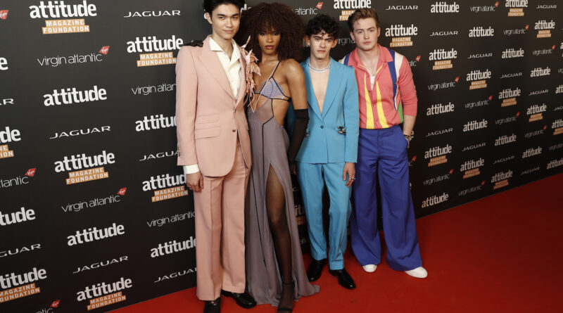 Photo of Heartstopper main cast standing on a red carpet at an event