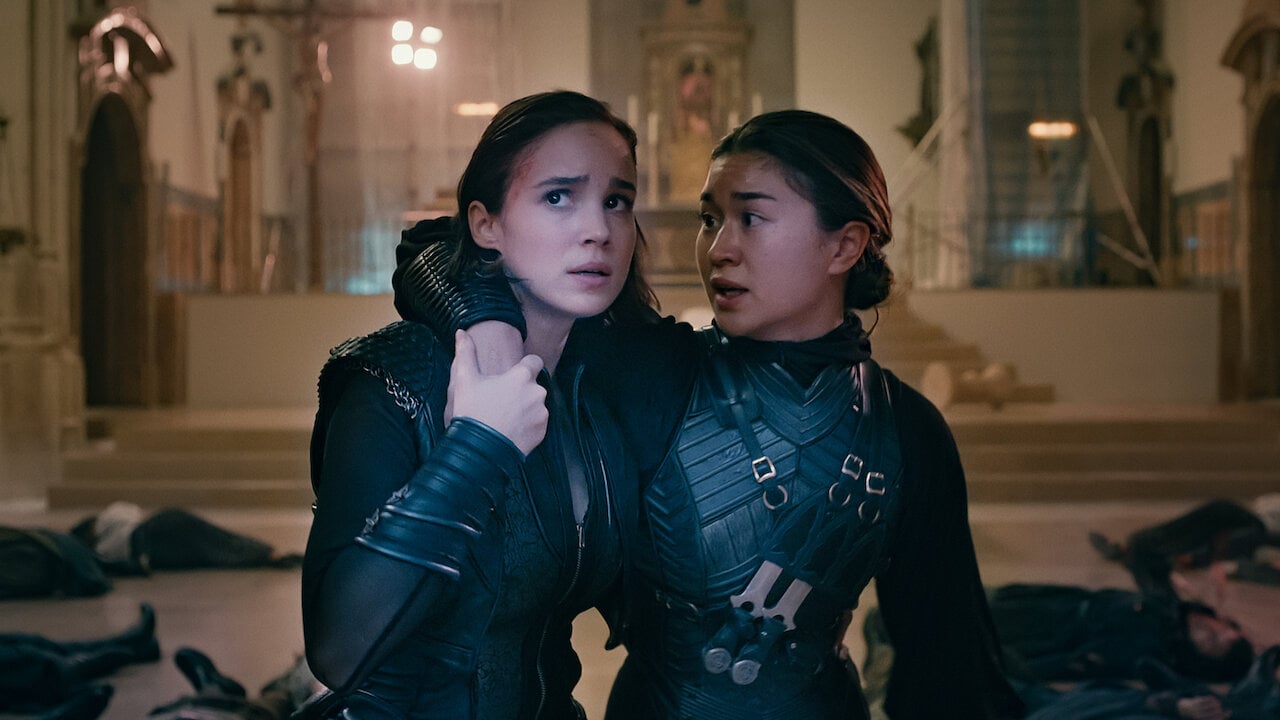 Photo of two characters from The Warrior Nun. one with their arm over the other's shoulder