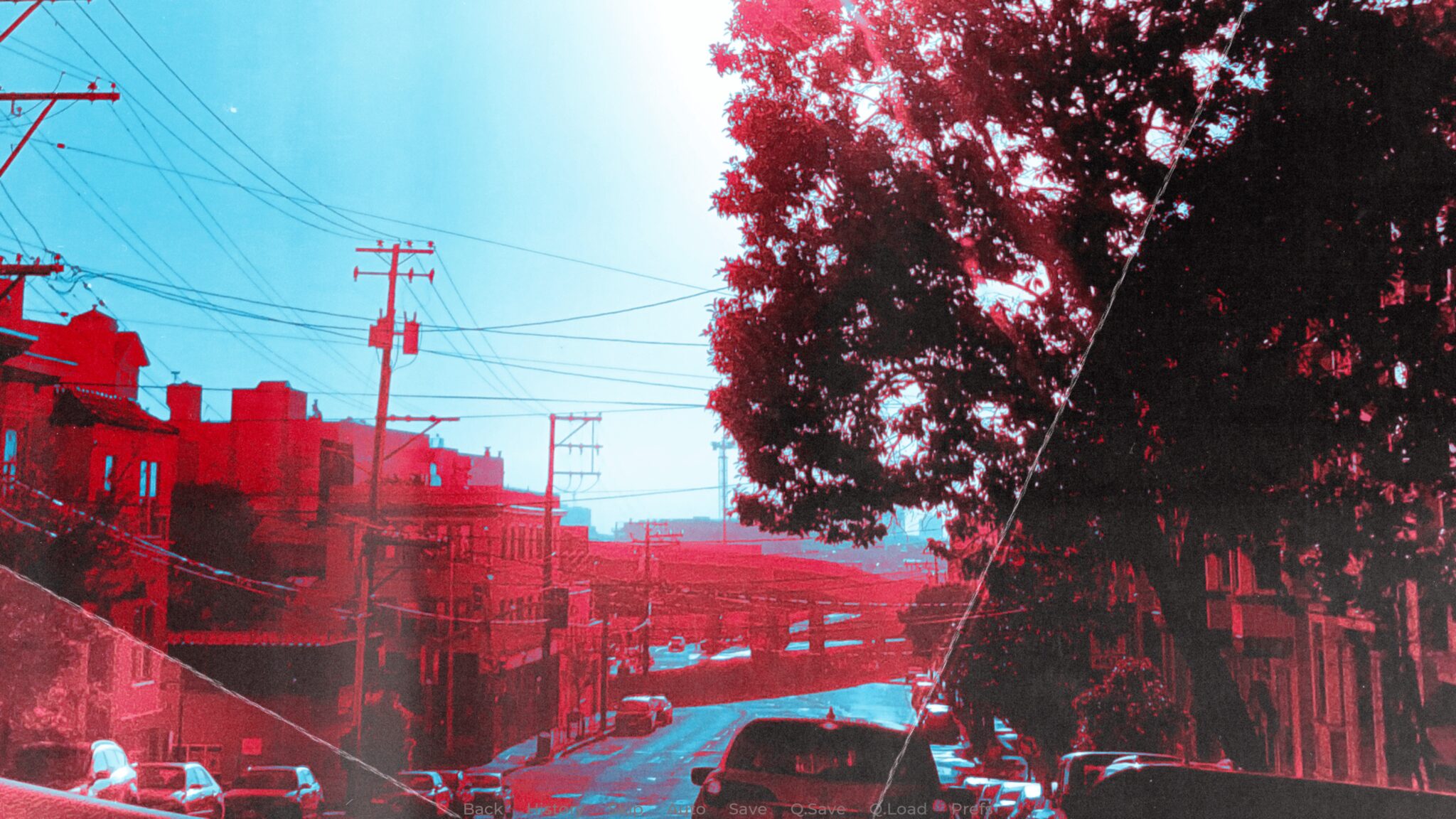 Photo of a street with a filter that makes everything red and blue from Three Days to Chicago