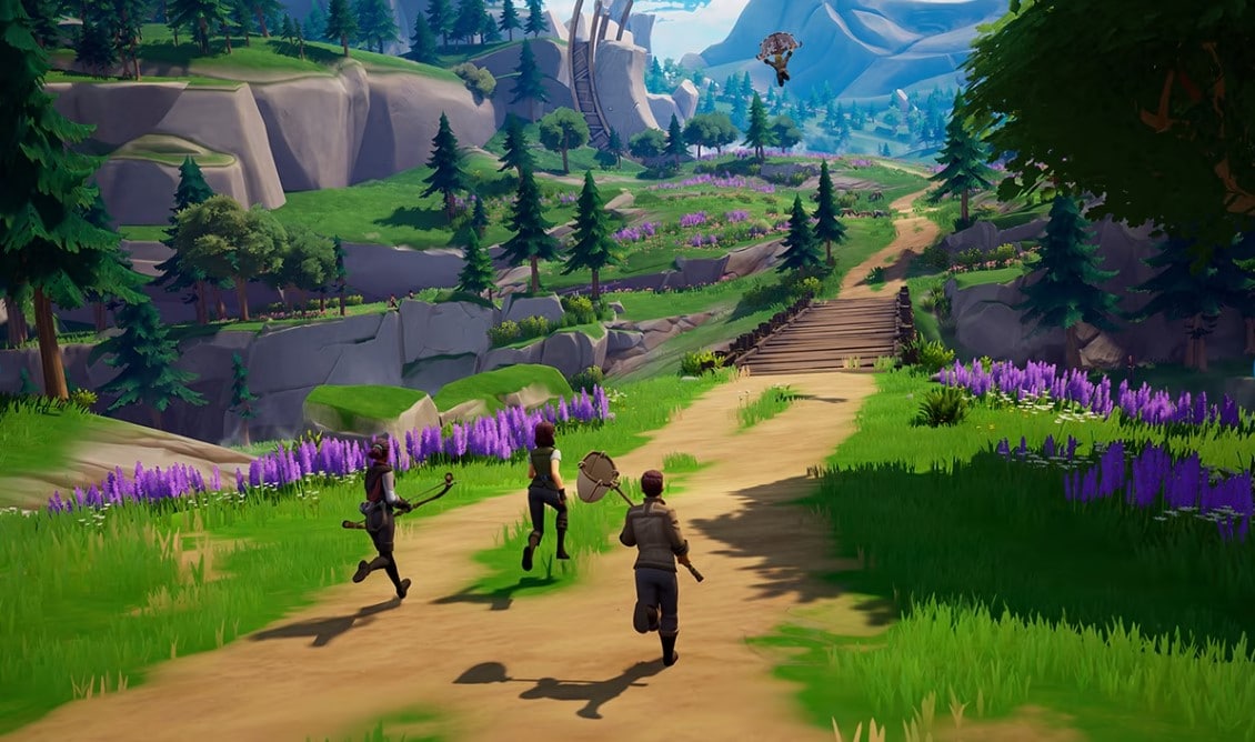 Screenshot from Palia of three characters walking on an outdoor trail