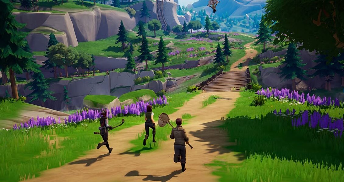 Screenshot from Palia of three characters walking on an outdoor trail