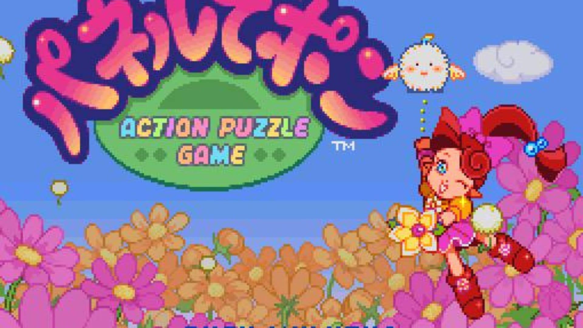 Panel de Pon title screen featuring a little red headed fairy surrounded by pink and orange flowers