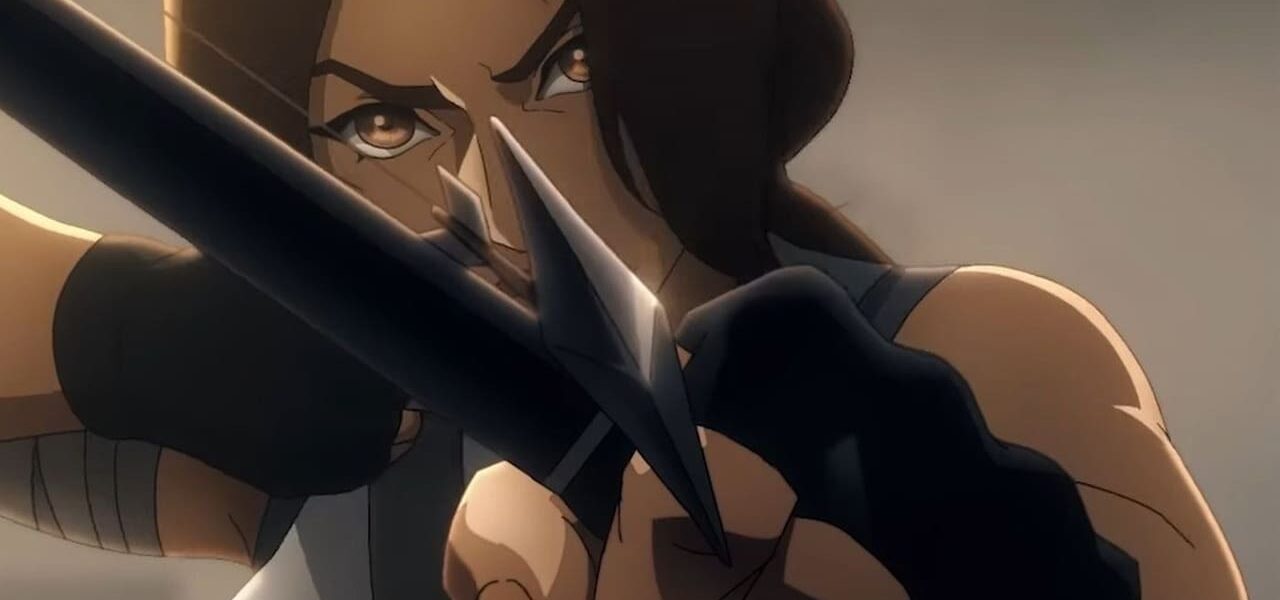 Screenshot of Lara Croft aiming a bow in the Tomb Raider: Legend of Lara Croft trailer