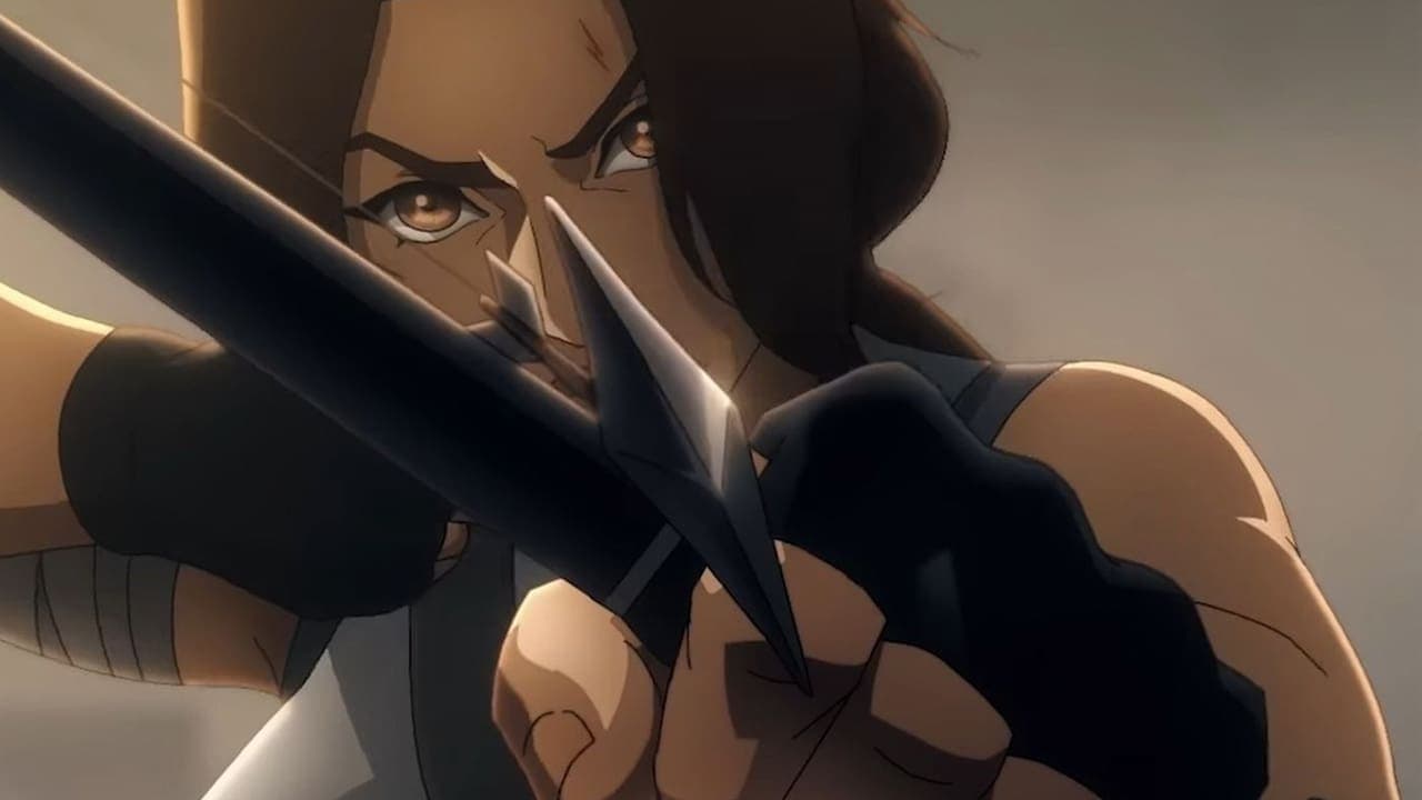 Screenshot of Lara Croft aiming a bow in the Tomb Raider: Legend of Lara Croft trailer