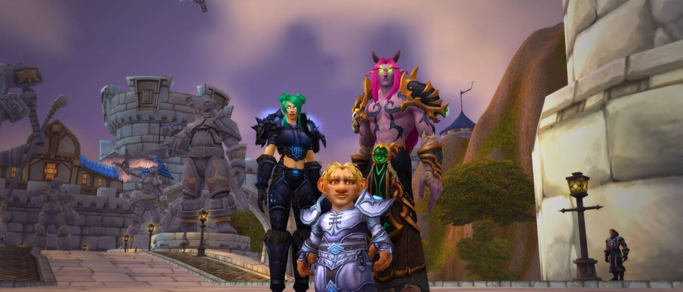 Screenshot of three World of Warcraft characters standing together facing the camera.