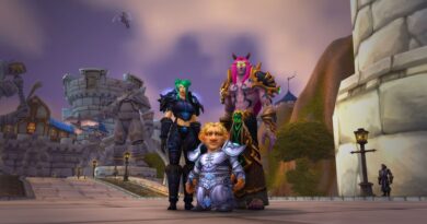 Screenshot of three World of Warcraft characters standing together facing the camera.